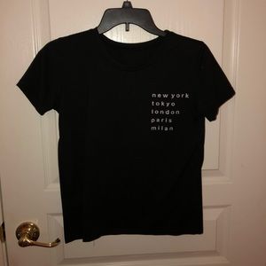 black t shirt , slightly cropped